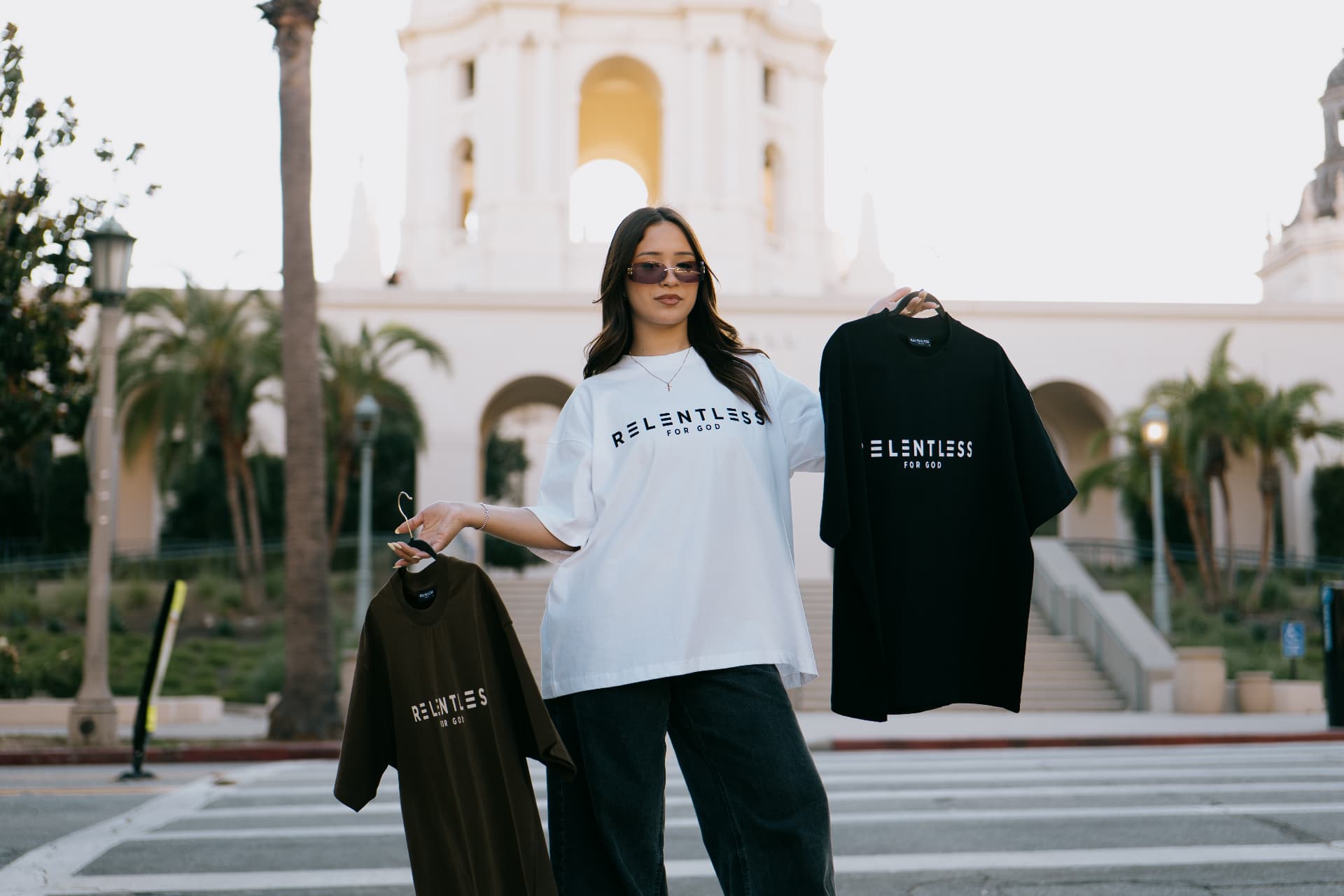 Relentless For God clothing rack with tees and cap
